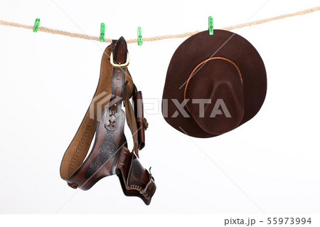 Cowboy Hat and Belt On A Clothesline 55973994