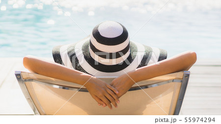 Portrait beautiful young asian woman happy smile and relax around swimming pool in hotel resort 55974294
