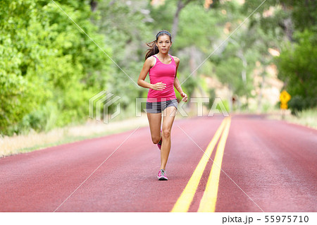 Running fit woman - female runner training Running fit woman - female runner training 55975710