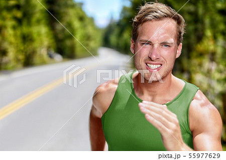 Athlete runner on intense cardio running workout 55977629