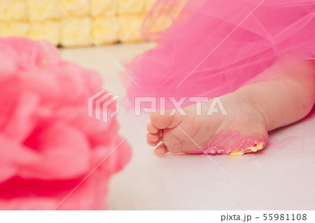 leg of baby food on white background. Feet and cake 55981108