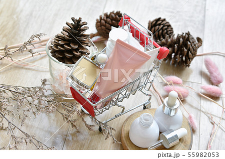 Cosmetic bottle container in shopping cart, Beauty 55982053