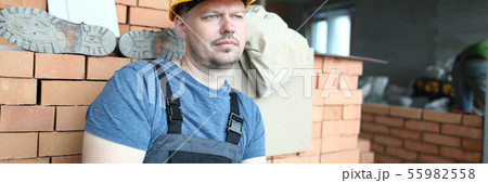 Concerned man in hardhat Concerned man in hardhat 55982558