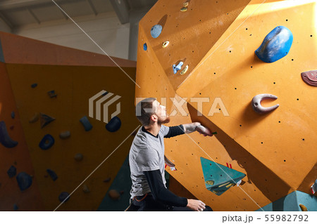 Climber gets ready to bouldering competition among people with physical disabilities Climber gets ready to bouldering competition among people with physical disabilities 55982792