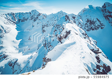 Spectacular landscape of snowy mountains in winter 55984975