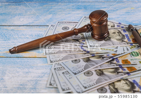 The judge's gavel, banknotes of American dollars 55985130