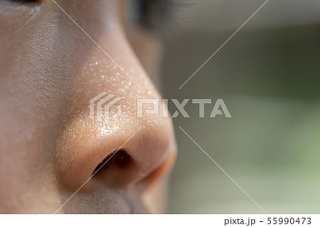 Close up nose of a child, sweat on nose. 55990473
