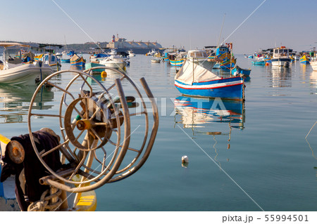 Marsaxlokk. Traditional boats Luzzu in the old harbor. 55994501