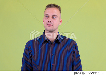 Face of handsome businessman thinking and looking up Face of handsome businessman thinking and looking up 55994502