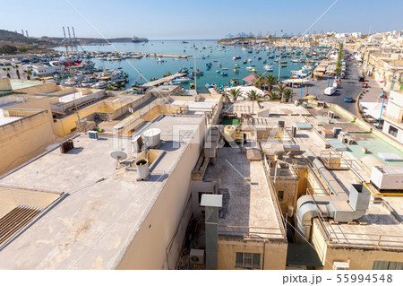 Marsaxlokk. Traditional boats Luzzu in the old harbor. 55994548