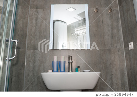 The photo of a sink in a bathroom The photo of a sink in a bathroom 55994947