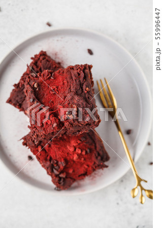 Beet brownie on gray plate. Healthy vegan food Beet brownie on gray plate. Healthy vegan food 55996447