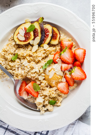 Quinoa breakfast porridge with strawberries Quinoa breakfast porridge with strawberries 55996700