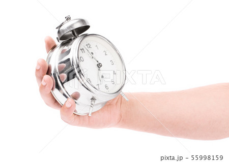 Male hand holding an alarm clock 55998159