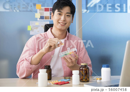 Office life concept, two asian business partners working in office 431 Office life concept, two asian business partners working in office 431 56007458