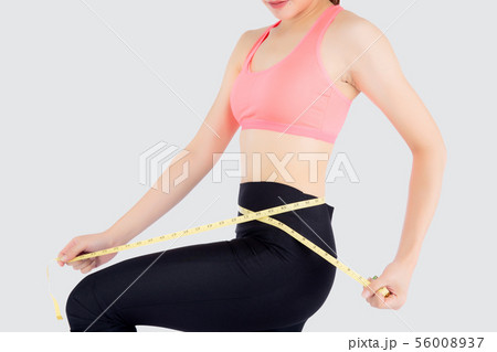 Beautiful slim young asian woman measuring tape 56008937