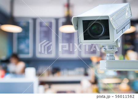 cctv camera or security camera on retail shop 56011562