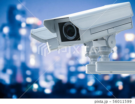 cctv camera or security camera on cityscape cctv camera or security camera on cityscape 56011599