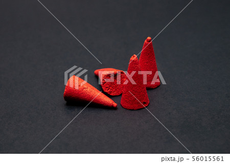 Close up Group of Red Incense on iSolated Black Close up Group of Red Incense on iSolated Black 56015561
