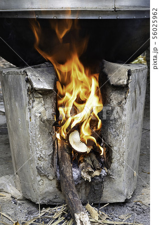 Yellow flame on the log in the oven. Yellow flame on the log in the oven. 56025962