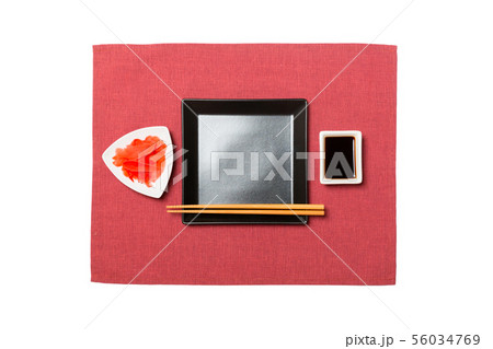 Empty black square plate with chopsticks for 56034769