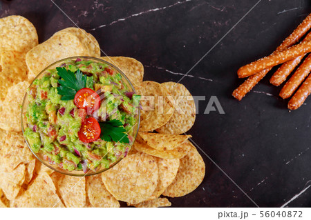 Mexican food nachos guacamole, doritos  56040872