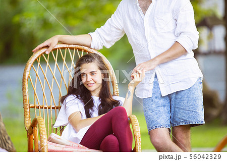 Happy couple at barbecue dinner on sunset time 56042329