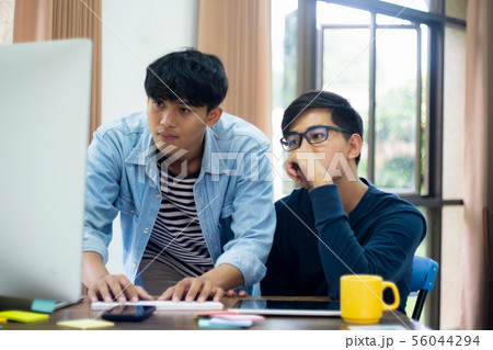 Programmers and developer teams are coding and Programmers and developer teams are coding and 56044294