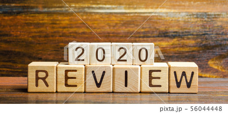 Wooden blocks with the word Review 2020. Wooden blocks with the word Review 2020. 56044448