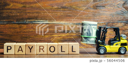 Wooden blocks with the word Payroll Wooden blocks with the word Payroll 56044506