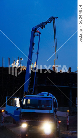Construction crane truck working on structure at Construction crane truck working on structure at 56044954