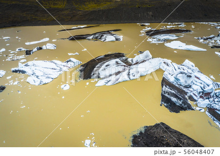 Aerial view of floating icebergs from glacier melt 56048407