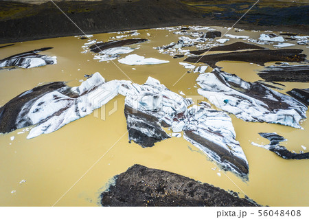 Aerial view of floating icebergs from glacier melt Aerial view of floating icebergs from glacier melt 56048408