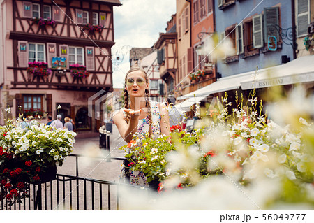 Woman tourist visiting the town of Colmar, Alsace, France 56049777