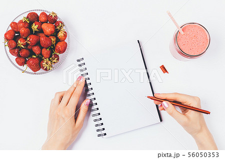 Flat lay arrangement of woman's hands Flat lay arrangement of woman's hands 56050353