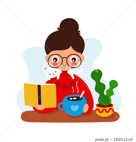 Cute happy smiling young girl at a desk Cute happy smiling young girl at a desk 56051219