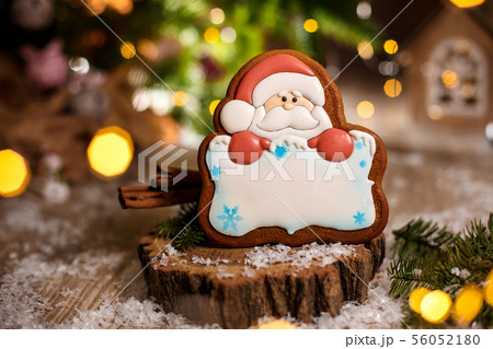 Holiday traditional food bakery. Gingerbread santa Holiday traditional food bakery. Gingerbread santa 56052180