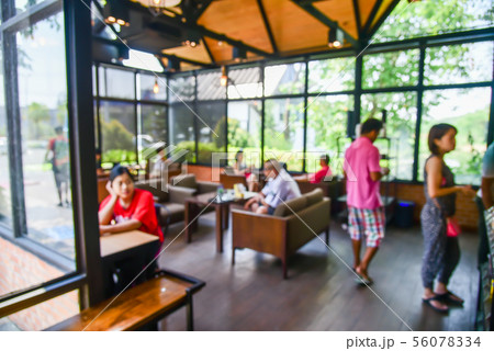 Blur coffee shop where people use the service 56078334