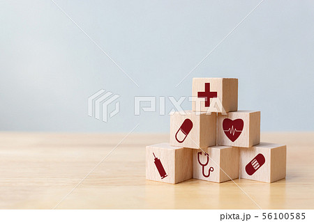 Wood block stacking with icon healthcare medical Wood block stacking with icon healthcare medical 56100585