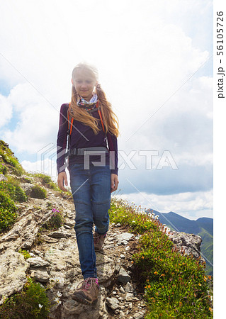 little girl hiker on a path 56105726