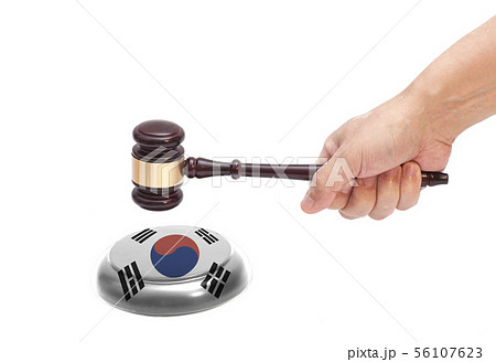 Hand knocking a Judge gavel at soundboard with Hand knocking a Judge gavel at soundboard with 56107623