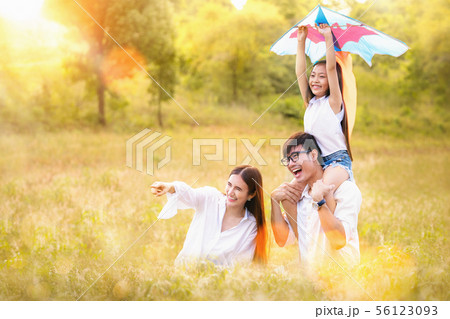 Asian family father, mother and daughter play ta Asian family father, mother and daughter play ta 56123093