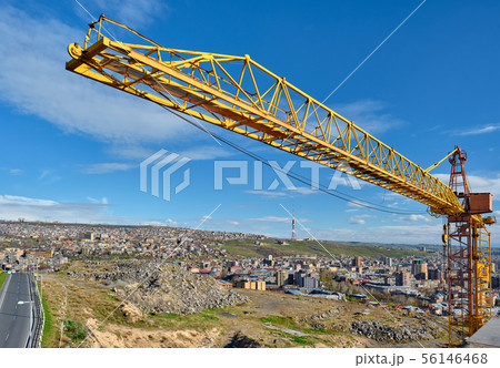 Jib crane tower against blue sky 56146468