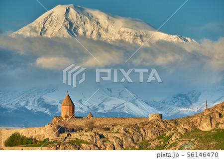 Ancient monastery in front of mountain 56146470