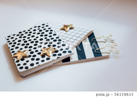 Desktop feminine composition. Notepads and stars 56159615