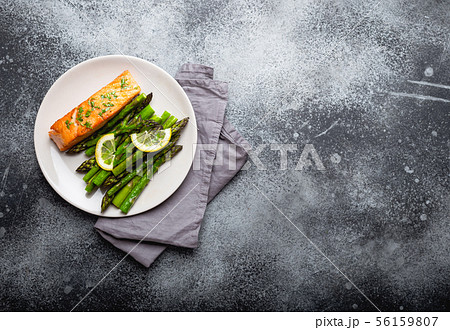 Grilled salmon with green asparagus Grilled salmon with green asparagus 56159807