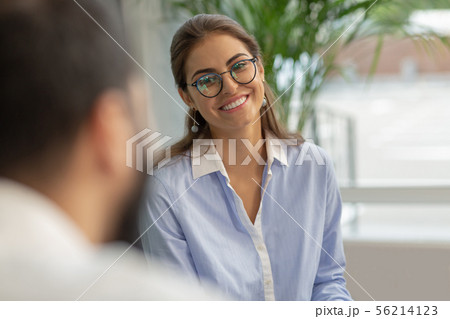 Charming brunette woman looking at her partner Charming brunette woman looking at her partner 56214123