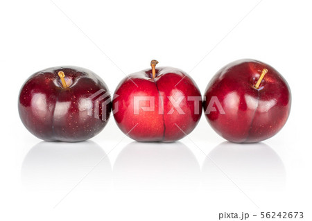 Ripe red plum isolated on white Ripe red plum isolated on white 56242673