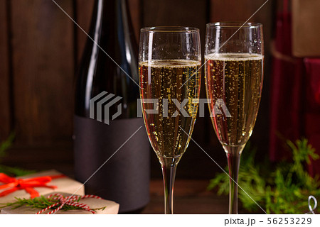 Christmas holiday table with glasses and a bottle 56253229