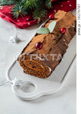 Bush de Noel Christmas Log Cake and New Year background. Copy space. 56270787